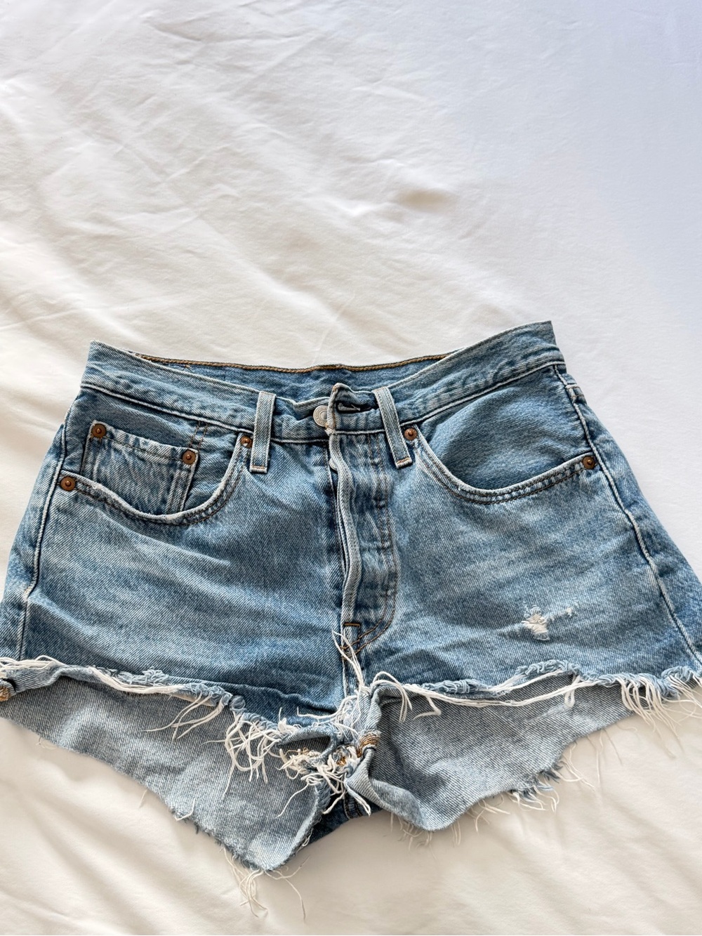 Levi's Light Blue Frayed Denim Cutoff Shorts